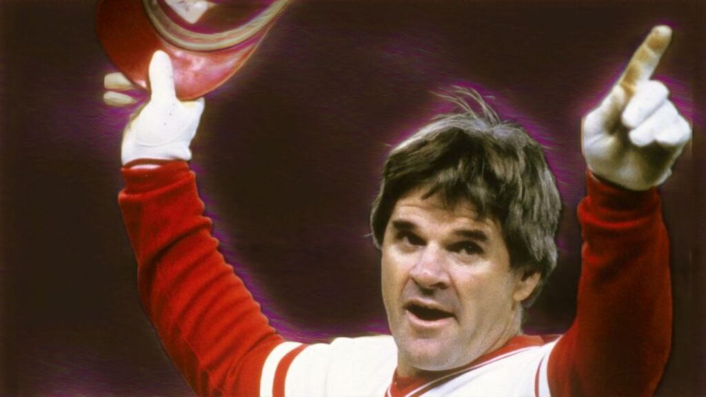 Pete Rose #14 of the Cincinnati Reds salutes the crowd after surpassing Ty Cobb with his 4,192nd hit against Eric Show of the San Diego Padres on September 11, 1985, at Riverfront Stadium.